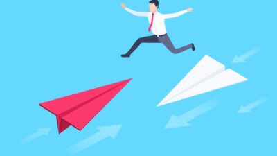 Illustration springende Person auf Papierfliegern